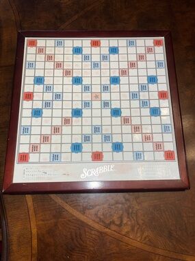 Scrabble Classic Game Board with Dark Red Frame on Turntable